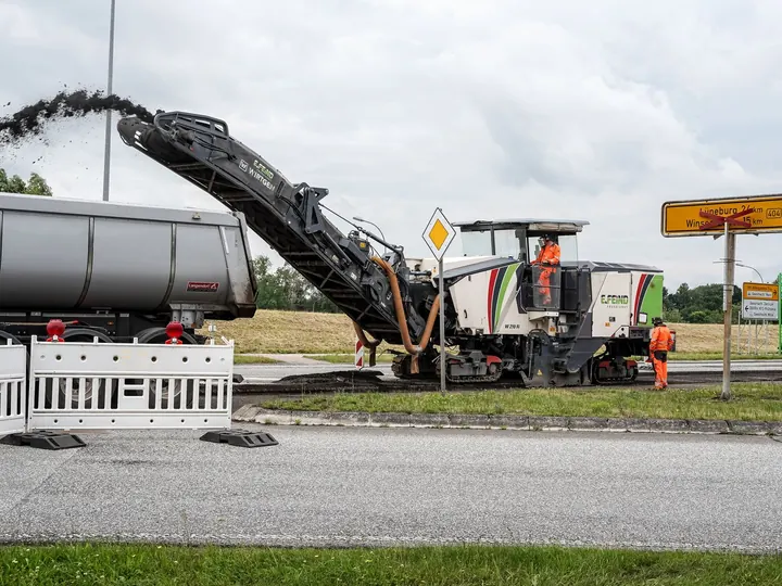 Road maintenance with milling machine in Geesthacht, Germany.